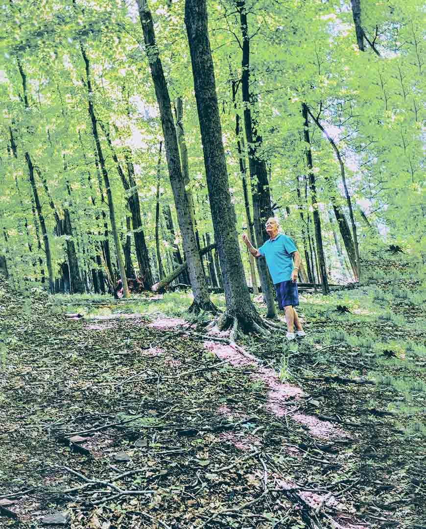 Man Walk Through Organic Farm Woods After Family Food Farming in Bound Brook